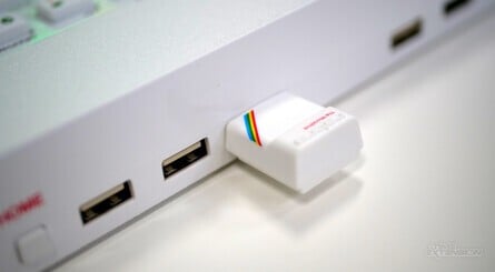 The machine comes with an issue of Crash magazine and a 'Microdrive' USB drive