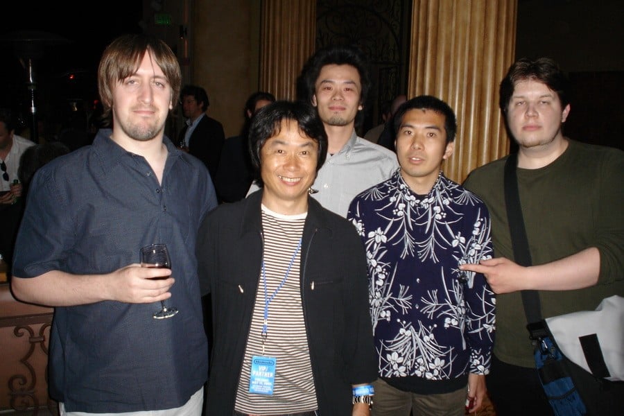 Dylan Cuthbert (left) with Shigeru Miyamoto (second left) and Q-Games staffers. That's seasoned games journo Chris Kohler photo-bombing on the right