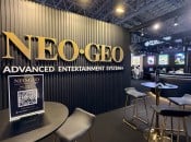 Neo Geo AES+ console with controllers displayed against neutral background
