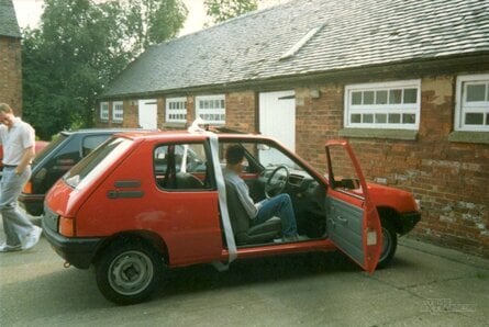 Kev Bayliss getting his first company car – note the original design of what would eventually become Donkey Kong Country barn in the background. "This was the day of my 17th birthday," Bayliss explains. "They bought Rare's first company car for me so I could learn to drive and get in and out without needing a lift from anyone. This was at about 5pm; I had no idea, and it was there in the car park courtyard with a ribbon around it. Stephen Stamper also had a new car that day, so there were suddenly two shiny new cars outside and I was gobsmacked – I'd only joined just before Xmas, and this was in the August"
