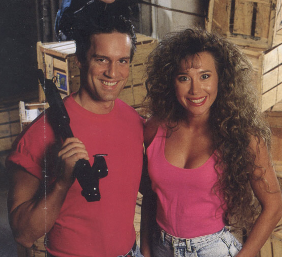 These two look VERY happy, but can you name the game?