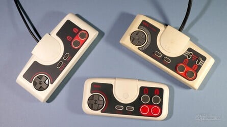 The 8BitDo PCE pad is a lovely update of the original (left). It compares favourably to the PC Engine Mini pad and the original (right)