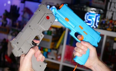 Here's the G'AIM'E gun compared to the Namco GunCon for PS1. Similar, no?