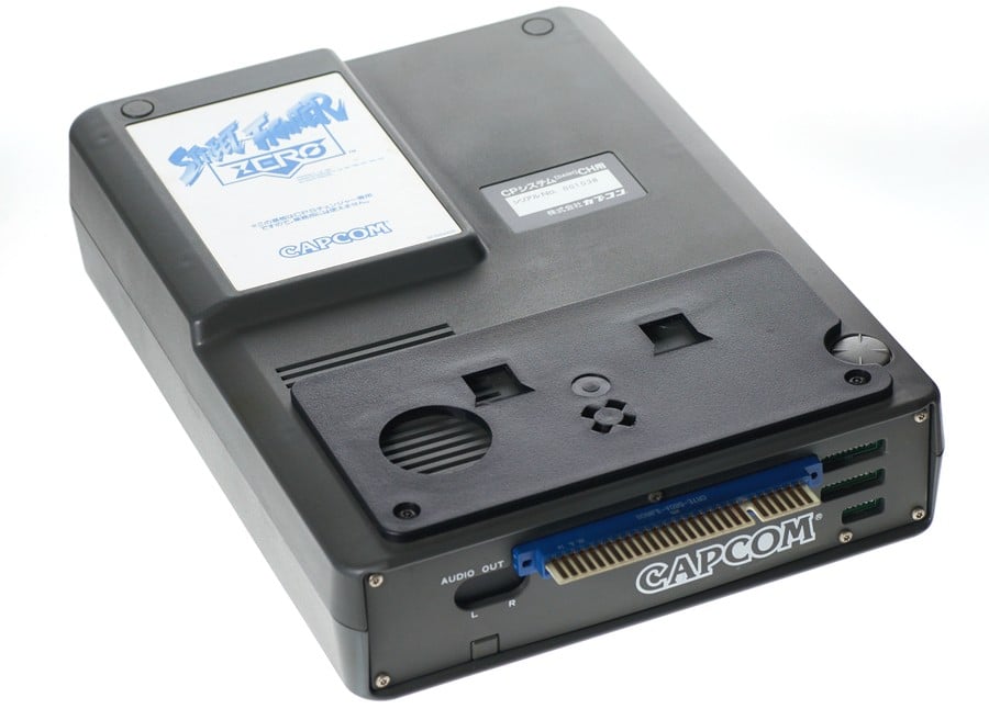 A CPS Changer game. This contained all of the elements required to run the title, with the CPS Changer acting as an interface for power, AV and control