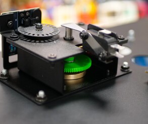 The underside of the Kraken panel shows the mechanism and Raspberry Pi 'brains'