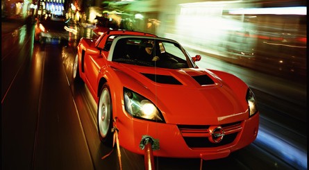 The game's cover star was the Opel Speedster - these shots are taken from the photoshoot and still show the camera rig in place. This would be removed digitally for the final shots