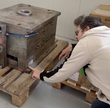 Commodore President Christian Simpson inspecting the C64C molds