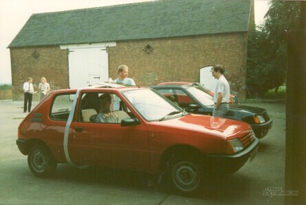 Kev Bayliss getting his first company car – note the original design of what would eventually become Donkey Kong Country barn in the background. "This was the day of my 17th birthday," Bayliss explains. "They bought Rare's first company car for me so I could learn to drive and get in and out without needing a lift from anyone. This was at about 5pm; I had no idea, and it was there in the car park courtyard with a ribbon around it. Stephen Stamper also had a new car that day, so there were suddenly two shiny new cars outside and I was gobsmacked – I'd only joined just before Xmas, and this was in the August"