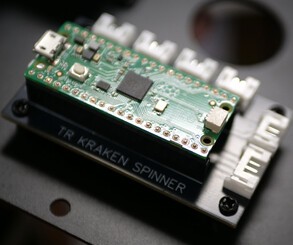The underside of the Kraken panel shows the mechanism and Raspberry Pi 'brains'