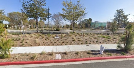 Atari's second Sunnyvale HQ at 1196 Borregas Avenue (left) and the car park Google replaced it with (right)