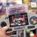 Hyperkin Is Re-Releasing Its 15-Year-Old Portable SNES In Two New Designs