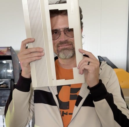 Commodore President Christian Simpson inspecting the C64C molds