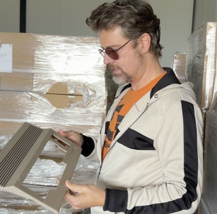 Commodore President Christian Simpson inspecting the C64C molds